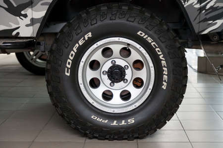 Novosibirsk, Russia - 02.26.2020: The most extreme all-season, off-road tire Cooper Discoverer STT...