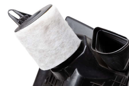 New white car air filter made of textured material close-up for air conditioning and prevent dust...