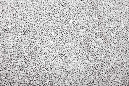 Gray foam texture made of cylindrical fibers. Background for transport companies engaged in packaging.の写真素材