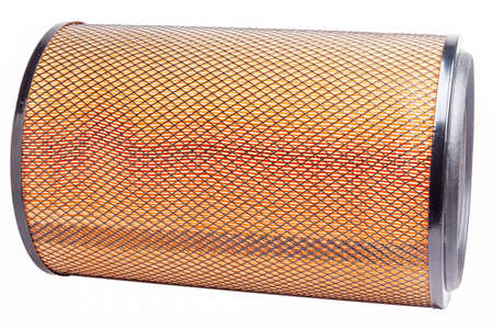 A cylindrical air filter for a truck lies horizontally on a white isolated background in a photo...