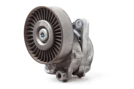 V-belt tensioner for attachments of an internal combustion engine of a car. Used auto parts catalogの写真素材