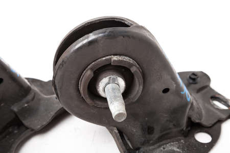 Suspension spare used parts for cars isolated on white background. Auto chassis lever. Auto service...
