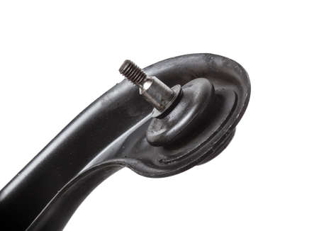 Ball joint on the arm of the car, part of the front suspension of the vehicle for repair and replacement in a vehicle repair shop. Spare parts catalog.の写真素材