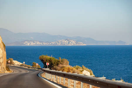 Highway in mountains near the sea in the summer Kas, Turkey.の写真素材