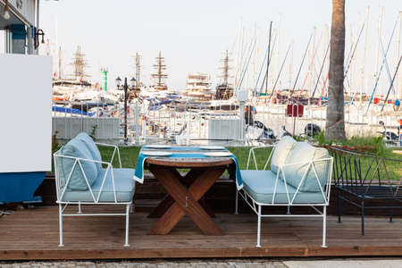 Cafe, outdoor restaurant on the embankment by the sea. Kemer Turkey 08.25.2021の写真素材