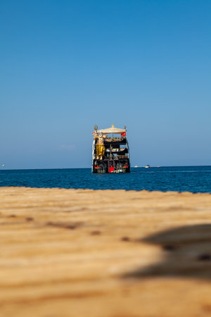 Kemer, Turkey - 08.25.2021: Big cruise ship Mega Star with tourists sailing in the sea in the hot summer day. Tourism and travel.のeditorial素材