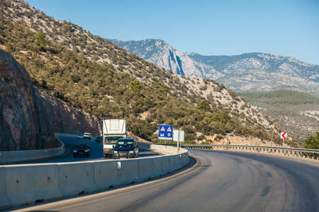 Highway in turkey among mountains and rocks while traveling on a hot summer day. Tourism and rest.の写真素材