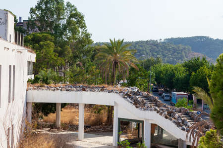 Camyuva, Turkey - 08.30.2021: Outdoors view of Abandoned Eco Dream Club Hotel in the Turkish village of kemer with stairsのeditorial素材