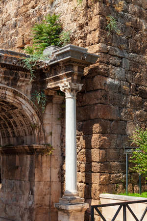 Antalya, turkey - 09.01.2021: Column of a famous tourist and archaeological site of Antalya is The Emperor Hadrian's gate in the old city. Travel destinations and vacation in Turkeyのeditorial素材