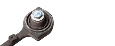 Close-up of a silent block on a used aluminum suspension with fasteners, spare parts for sale during...