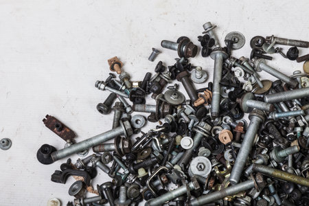 Background of bolts and nuts of different lengths and threads. industry and production.の写真素材