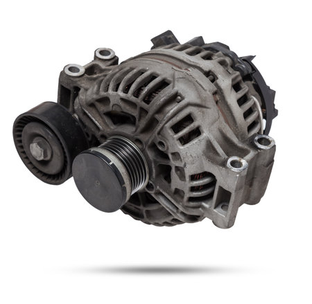 Car generator, car electrical network element on white background, generator details close-up. Spare auto parts for repair.の写真素材