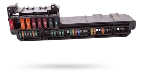 Automotive fuses box in different colors and each color is responsible for the specific value of the...
