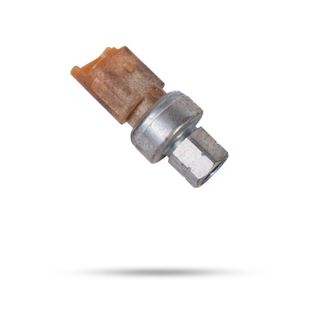 Oil pressure sensor of car isolated on white background. New spare parts.の写真素材
