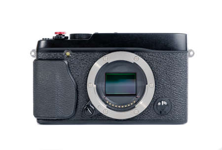 Small black compact mirror-less camera on a white backgroundの写真素材