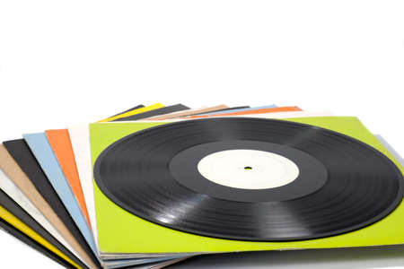 Colorful vinyl records on white isolated background