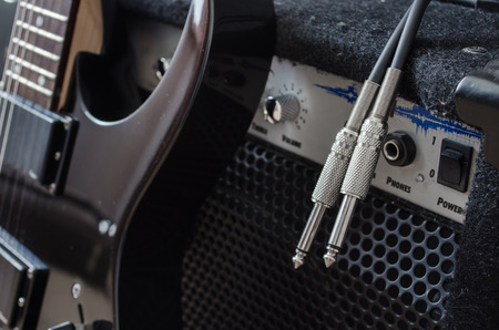 electric guitar and combo amp, dark colorsの写真素材