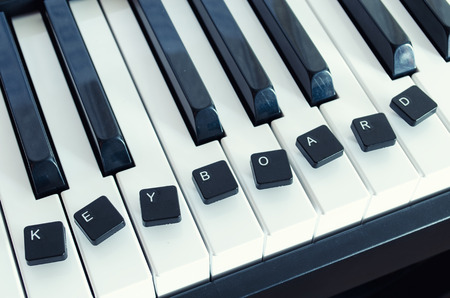 Piano keyboard with keys on a computer keyboardの写真素材