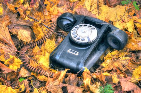 old broken phone on the autumn street HDRの写真素材