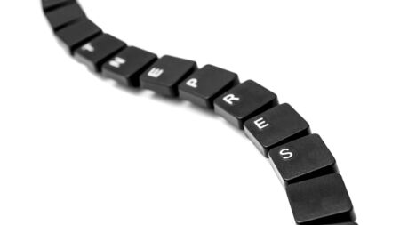 snakes of computer keys on a white background