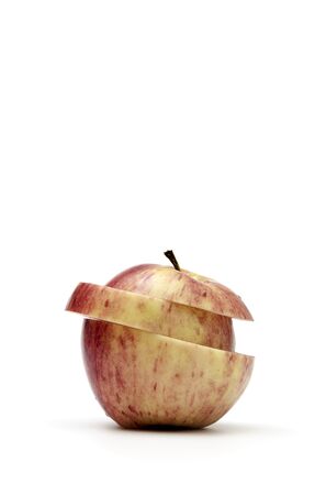 apple with a cut in the middle, with a fresh cropの写真素材