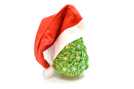 Christmas souvenirs, Santa hat and Christmas treeの写真素材
