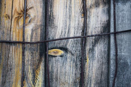 texture old battered board and metal barsの写真素材