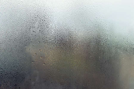 texture of a window closeup, glass with water droplets