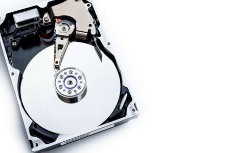 Disassemble the hard drive from the computer, the hard drive with a mirror effect.