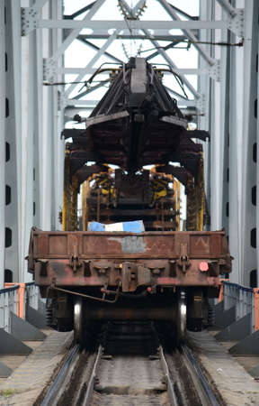 outgoing train with wagons, for transportation of goods, over long distances, by rail
