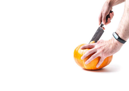 A pumpkin cooked to make a halloween lantern, and a sharp knife for making a face, Jack Lantern, Halloween attributeの写真素材