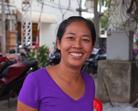 Pa Tong - APRIL 26:  Thai woman in the prime of life smiling. April 26, 2012  in Patong, Thailand. Traditionally friendly Thai women in Asiaのeditorial素材
