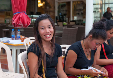 Pa Tong - APRIL 26:  Thai students preparing for the exam. April 26, 2012  in Patong, Thailand. Traditionally friendly Thai women in Asiaのeditorial素材