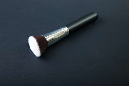 Professional make-up brush on black background, natural cloth,の写真素材