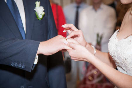 Close up Groom Put the Wedding Ring on bride