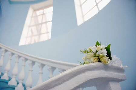 bouquet of flowers on a ladderの写真素材