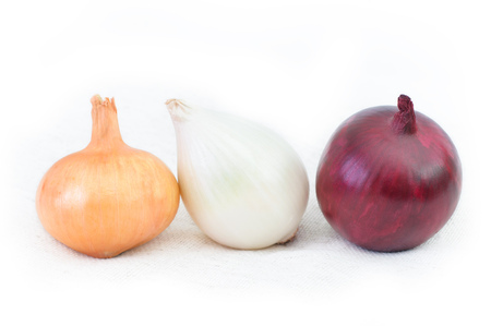 Red and white onion, isolated on white background. Three different kinds of onionsの写真素材