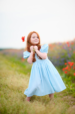 Adorable little girl on warm and sunny summer dayの写真素材