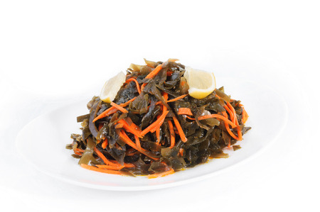  Slimming Seaweed Salad on white plate isolatedの写真素材