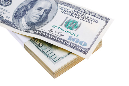 Stack of hundred dollars isolated on white