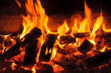Glowing Log in a Dying Fireの写真素材