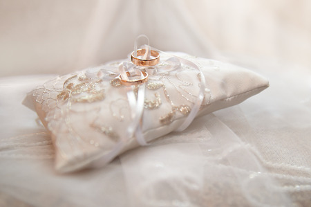 Wedding rings. Bright white background.の写真素材