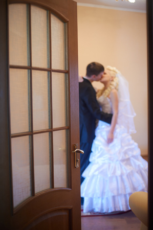 Newly Married Couple Honeymoon Romance in Hotel Room. Blurred soft focusの写真素材