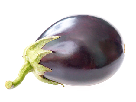 Ripe round violet eggplant. Close-up on white backgroundの写真素材