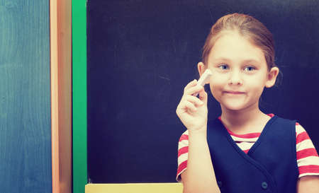 schoolgirl and blackboard