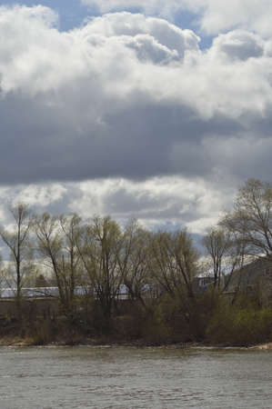 big cloud over the riverの写真素材