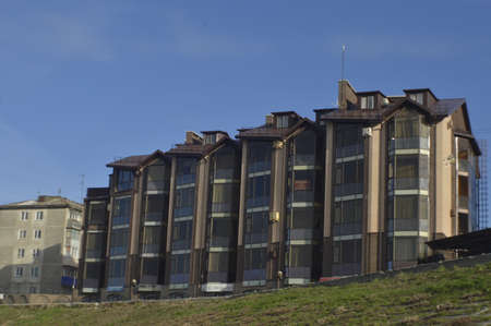 big modern city house on the sky backgroundの写真素材