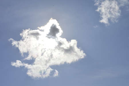 a white cloud cover the sunの写真素材