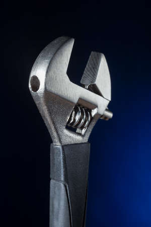 fashionable wrench on a blue backgroundの写真素材