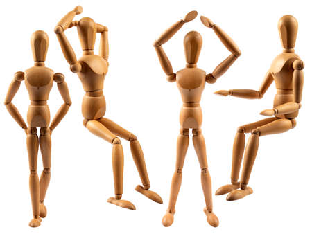 wooden mannequin of a man on hinges in poses at the workplaceの写真素材